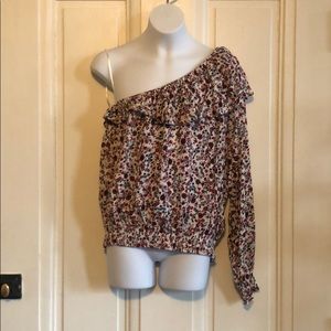 One sleeved off the shoulder blouse